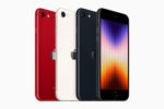 Three Apple iPhone 8 models in red, white, and black colors, showcasing the glass backs and colorful gradient wallpapers on the displays, highlighting the smartphone’s design and color options.