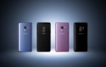 Four Samsung Galaxy smartphones in different colors – lilac purple, black, orchid pink, and blue – arranged side by side on a dark background, showcasing the sleek design and color options of Samsung’s flagship mobile devices.